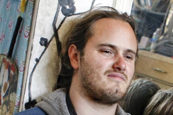 Conspiracy-laden attacker claims media influence in tearful testimony