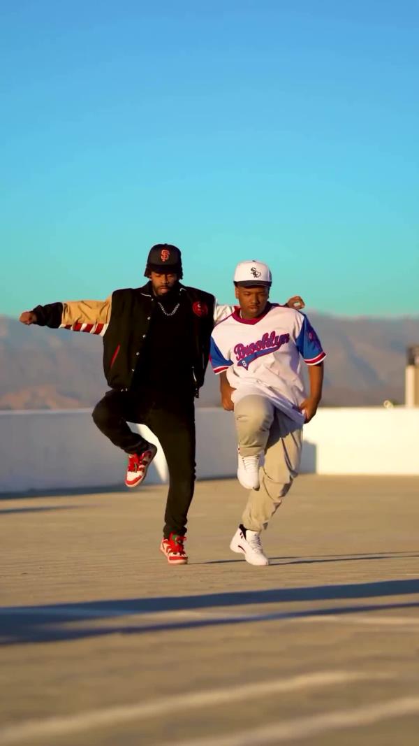 Chris Brown showcasing his dancing skills with joy and finesse