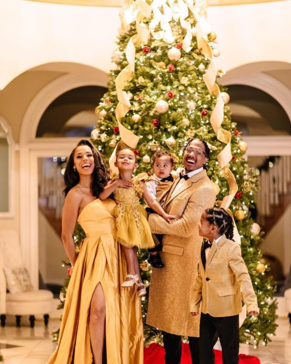 Nick Cannon and Family Sparkle in Gold for Christmas Festivities