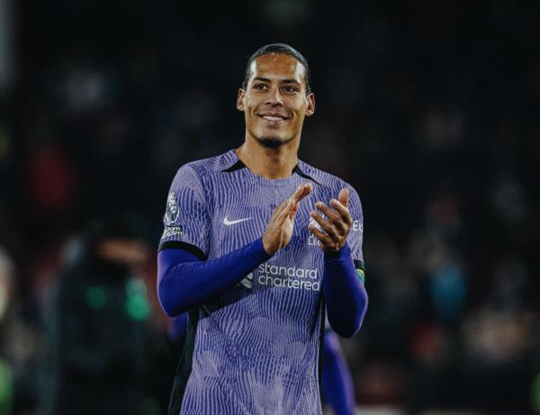 Virgil van Dijk's Victorious Celebration with Teammates