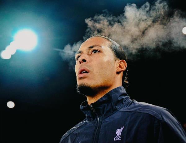 Virgil van Dijk's Victorious Celebration with Teammates